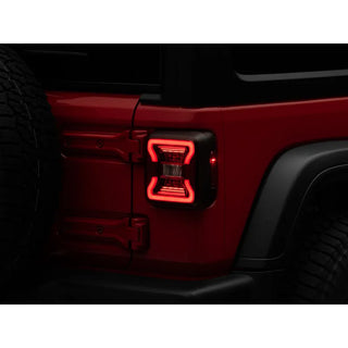 Raxiom LED Tail Lights Black Housing Red Lens: Jeep Wrangler JL 2018-2025 2.0L/3.6L