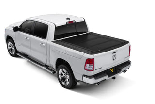 UnderCover Ultra Flex Matte Black Folding Truck Bed Cover: Fits Ram 1500 (19-26) w/ Rambox