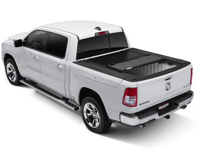 UnderCover Ultra Flex Matte Black Folding Truck Bed Cover: Fits Ram 1500 (19-26) w/ Rambox