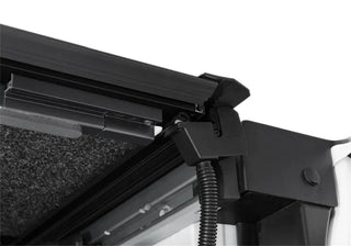 UnderCover Ultra Flex Matte Black Folding Truck Bed Cover: Fits Ram 1500 (19-26) w/ Rambox
