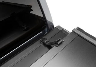 Undercover Triad Hard-Folding Truck Bed Cover 5.7ft (No RamBox): Ram 1500 (02-26) - Matte Black