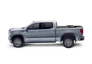 Undercover Triad Hard-Folding Truck Bed Cover 6.4ft: Ram 1500 (19-26) - Matte Black
