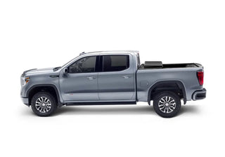 Undercover Triad Hard-Folding Truck Bed Cover 6.4ft: Ram 1500 (19-26) - Matte Black