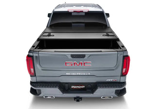 Undercover Triad Hard-Folding Truck Bed Cover 6.4ft: Ram 1500 (19-26) - Matte Black