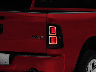 Raxiom Smoked LED Tail Lights Black Housing: Ram 1500 Big Horn / Express / Tradesman (2011-2018)