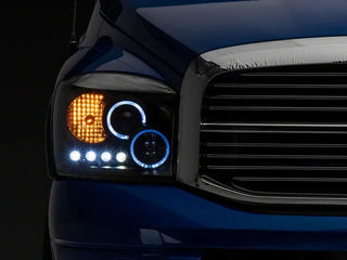 Raxiom LED Halo Projector Headlights (FRONT): Fits Dodge Ram (02-10)