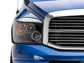 Raxiom LED Halo Projector Headlights (FRONT): Fits Dodge Ram (02-10)
