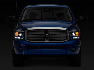 Raxiom LED Halo Projector Headlights (FRONT): Fits Dodge Ram (02-10)