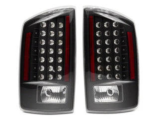 Raxiom LED Tail Lights Black Housing Clear Lens: Fits Most Dodge Ram 1500 Models (2002-2010)