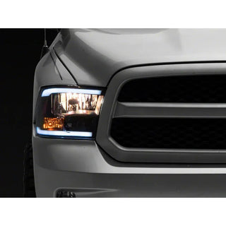 Raxiom Axial Sequential LED Bar Black Housing Headlights (FRONT): Fits Dodge / Ram (02-18)