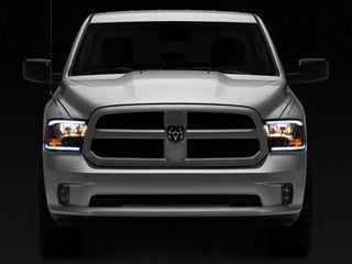 Raxiom Axial Sequential LED Bar Black Housing Headlights (FRONT): Fits Dodge / Ram (02-18)