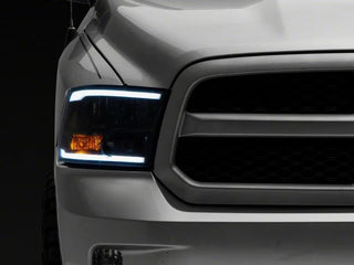 Raxiom Axial Series Black Housing Headlights w/ LED Bar (F&R): Fits Dodge / Ram (02-18)