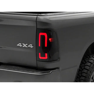 Raxiom Axial Series LED Tail Lights: Fits Dodge / Ram 1500 / 2500 / 3500 (02-18) - Black Smoked