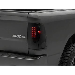 Raxiom Axial Series LED Tail Lights - Black Housing Smoked Lens (REAR): Fits Dodge / Ram (02-18)