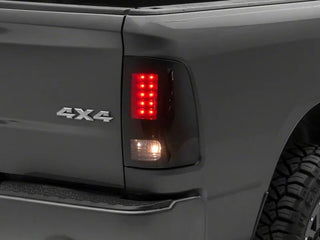 Raxiom Axial Series LED Tail Lights - Black Housing Smoked Lens (REAR): Fits Dodge / Ram (02-18)