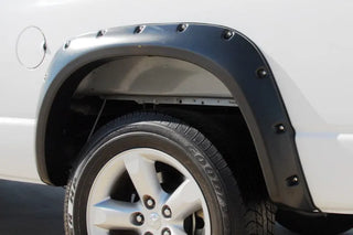 LUND RX-Rivet Style Riveted Fender Flares 4-Piece Set: Ram 1500 (19-24) - Smooth Black
