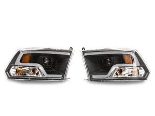 Raxiom LED Halo Projector Headlights Black Housing (F&R): Dodge Ram / Ram 1500 (02-18)