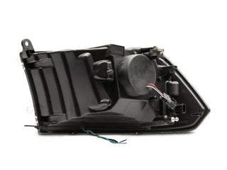 Raxiom LED Halo Projector Headlights Black Housing (F&R): Dodge Ram / Ram 1500 (02-18)