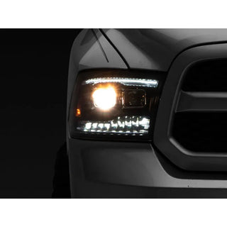 Raxiom Black LED Projector Headlights w/ Switchback (F&R): Dodge Ram / Ram 1500 (02-18)