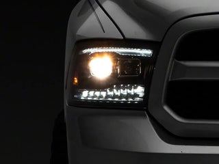 Raxiom Black LED Projector Headlights w/ Switchback (F&R): Dodge Ram / Ram 1500 (02-18)