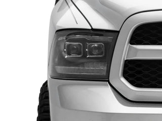 Raxiom Black LED Projector Headlights w/ Switchback (F&R): Dodge Ram / Ram 1500 (02-18)