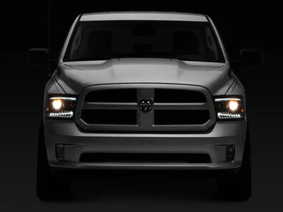 Raxiom Black LED Projector Headlights w/ Switchback (F&R): Dodge Ram / Ram 1500 (02-18)