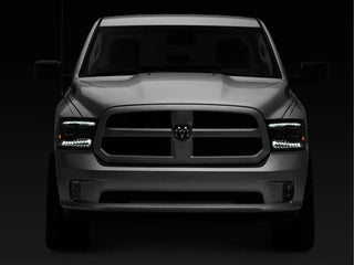 Raxiom Black LED Projector Headlights w/ Switchback (F&R): Dodge Ram / Ram 1500 (02-18)