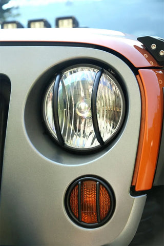 Rugged Ridge Textured Black Headlight Euro Guards: Fits Most Jeep Wrangler Models (2007-2018)
