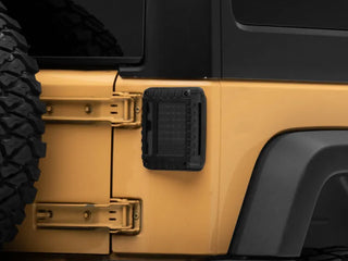Raxiom LED Tail Lights Black Housing Smoked Lens: Fits Most Jeep Wrangler Models (2007-2018)