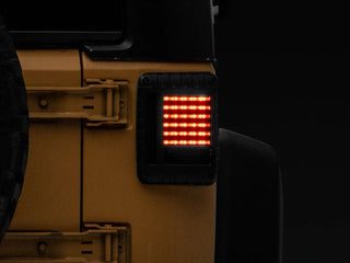 Raxiom LED Tail Lights Black Housing Smoked Lens: Fits Most Jeep Wrangler Models (2007-2018)