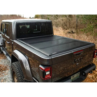 UnderCover Armor Flex Hard Folding Bed Cover 5ft (FITS) Matte Black: Jeep Gladiator (18-26)