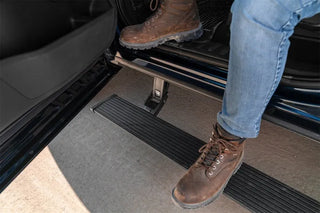 AMP Research PowerStep Plug N Play Auto Running Boards - Black: Dodge Durango (11-26)