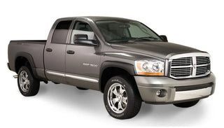 Bushwacker OE Style Fender Flares 4pc (4-DOOR): Dodge Ram 1500/2500/3500 (06-09) - Black