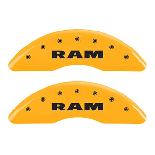 MGP Caliper Covers (FRONT AND REAR): Dodge Ram 2500 / Ram 3500 (2010) w/ Yellow Finish, Black Characters, RAM Logo