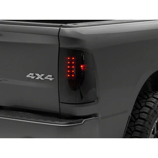 Raxiom Axial Series LED Tail Lights - Black Housing Smoked Lens: Fits Most Dodge / Ram 1500 / 2500 / 3500 Models (2002-2018)