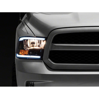 Raxiom Axial Series Black Housing Headlights w/ LED Bar: Fits Most Dodge / Ram 1500 / 2500 / 3500 Models (2002-2018)