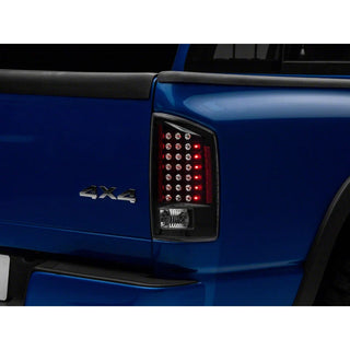Raxiom LED Tail Lights Black Housing Clear Lens: Fits Most Dodge Ram 1500 Models (2002-2010)
