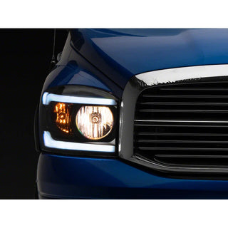 Raxiom Axial Headlights w/ SEQL LED Bar (Clear Lens, Black Housing): Fits Most Dodge Ram Models (2006-2009)