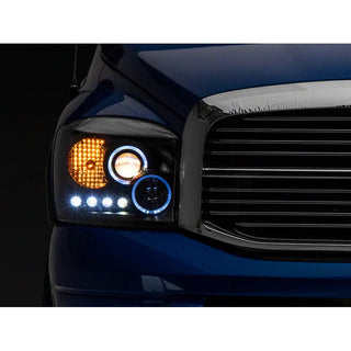 Raxiom LED Halo Projector Headlights Black Housing (Clear Lens): Fits Most Dodge Ram Models (2002-2010)