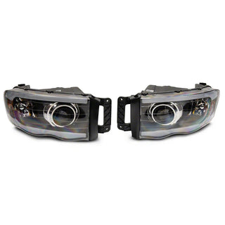 Raxiom Axial LED Projector Headlights (PAIR) - Black Housing / Clear Lens: Fits Most Dodge Ram Models (2002-2010)