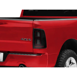 Raxiom Smoked LED Tail Lights Black Housing: Ram 1500 Big Horn / Express / Tradesman (2011-2018)