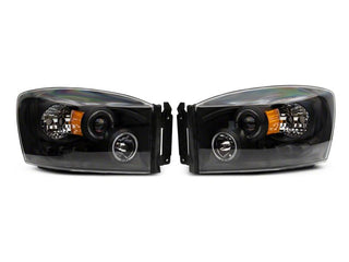 Raxiom LED Halo Projector Headlights Black Housing (Clear Lens): Fits Most Dodge Ram Models (2002-2010)