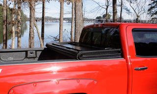 LUND Hard Fold Tonneau Cover Black: Fits Dodge Ram 1500/2500/3500 2002-2024