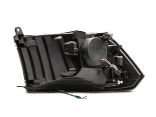 Raxiom 09-18 RAM 1500 LED Halo Projector Headlights- Black Housing (Clear Lens)