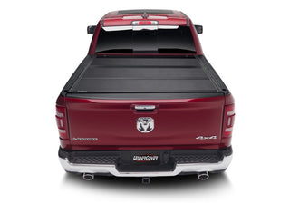 UnderCover Armor Flex 8ft Hard Folding Bed Cover: Fits Most Ram 1500 / 2500 / 3500 Models (2002-2026)