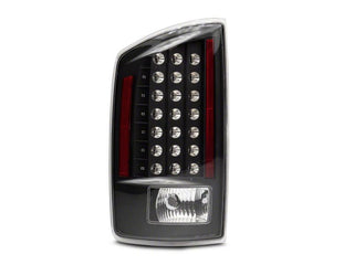 Raxiom LED Tail Lights Black Housing Clear Lens: Fits Most Dodge Ram 1500 Models (2002-2010)