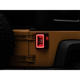 Raxiom JL Style LED Tail Lights - Black Housing / Red Lens: Fits Most Jeep Wrangler Models (2007-2018)