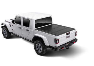 UnderCover Ultra Flex Folding Truck Bed Cover (5ft) Matte Black Finish: Fits Most Jeep Gladiator Models (2018-2026)
