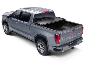 UnderCover Triad Hard-Folding Truck Bed Cover 5.7ft (Does Not Fit RamBox): Fits Most Ram 1500 Models (2002-2026) - Matte Black