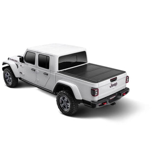 UnderCover Ultra Flex Folding Truck Bed Cover (5ft) Matte Black Finish: Fits Most Jeep Gladiator Models (2018-2026)
